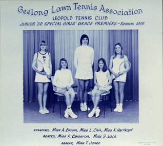 Winning divisional team with tennis racquets