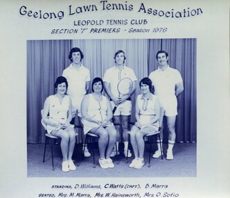Winning divisional team with tennis racquets