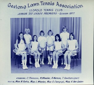 Winning divisional team with tennis racquets