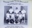 Winning divisional team with tennis racquets