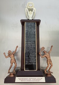Wooden and plastic trophy with female and male tennis players