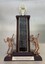 Wooden and plastic trophy with female and male tennis players