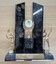 Plastic and wooden trophy with male and female tennis players