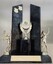 Plastic and wooden trophy with male and female tennis players