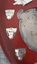 Wooden shield with inscribed silver metal plates