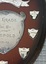 Wooden shield with silver metal plates