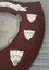 Wooden shield with inscribed silver plates