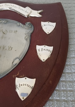 Wooden shield with inscribed silver plates