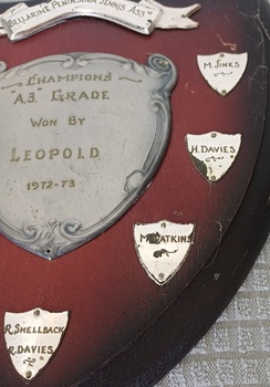 Wooden shield with inscribed silver plates