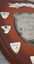 Wooden shield with inscribed silver plates