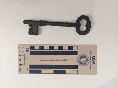 Corroded iron key associated with the door of the former Wollert Church