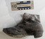 Hand made leather boot that has some signs of decay. 