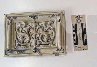 Cream painted Lead ventilation grate with geometric design.