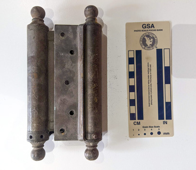 Iron door hinge with five holes for securing the plate to the wall