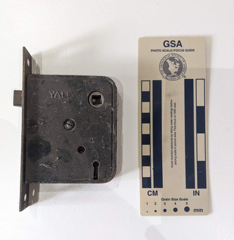 Iron door lock with YALE inscribed on the top 