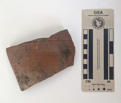 Ceramic shard with brown matt finish applied in a sponge style