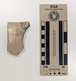 Ceramic shard with white glazed finish 