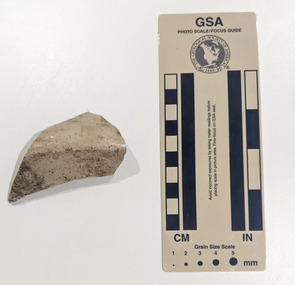 Ceramic shard with white glazed finish 