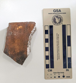 Ceramic shard with orange finish
