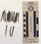 Collection of 19 corroded medium-sized nails with a wedge shape spring.