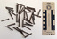 Collection of corroded nails with a rectangular shaft that narrows to a blunt tip.