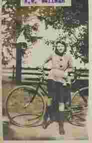 Photograph - Girl with a bicycle, 1925c