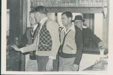 Photograph - (LtoR): Red McIneney, Joe Cavenagh, Johnny O'Brien and Parlour Bar Person. Unclear which pub - perhaps the Carrington or the Union, Undated