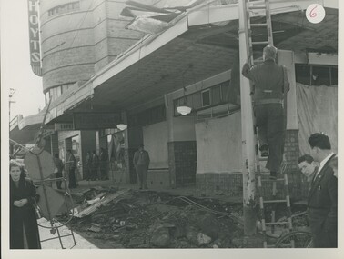 Photograph - Damage to footpath and eaves due to the gas explosion, Sydney Road, 20 Sep 1958