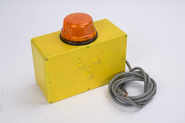 Bulldozer tilt warning alarm