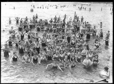 Photograph, "On Christmas morning -- Bathing at St Kilda", 1933