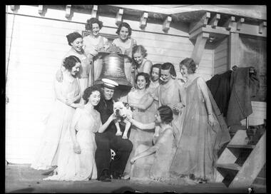 Photograph, Bull, Hugh Jones, 1897-1993, Naval Tattoo: girl dancers with sailor and naval mascot, Bruce of Woodside
