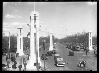 Photograph, Bull, Hugh Jones, 1897-1993, View looking along St Kilda Road [completed Centenary pylons on Princes Bridge]
