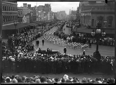 Photograph, Bull, Hugh Jones, 1897-1993, [St Patrick's Day Parade, Bourke Street, Melbourne]