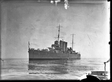 Photograph, Bull, Hugh Jones, 1897-1993, Warship at anchor [HMAS Canberra?]