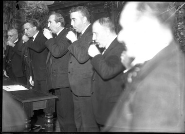 Photograph, Bull, Hugh Jones, 1897-1993, Lord Mayor Gengoult-Smith, Robert Menzies and others drinking a toast, Melbourne Town Hall