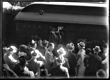 Photograph, Bull, Hugh Jones, 1897-1993, Cricketers disembark from Adelaide train, Spencer Street Station