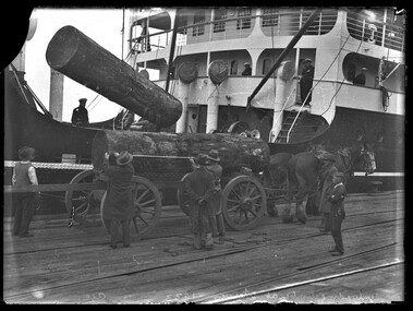 Photograph (item), Bull, Hugh Jones, 1897-1993, Unloading timber at Victoria Dock, 1933