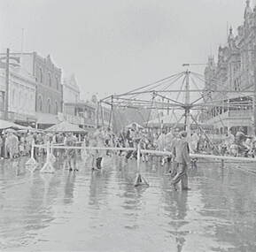 Negative - Bendigo Easter Fair 1956 - Williamson St - Rain, Allan Doney, 1950 -1970
