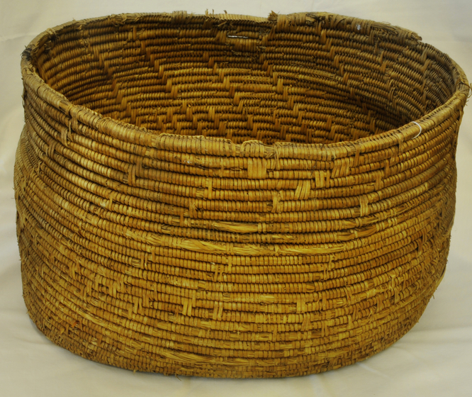 a round basket woven with fibres