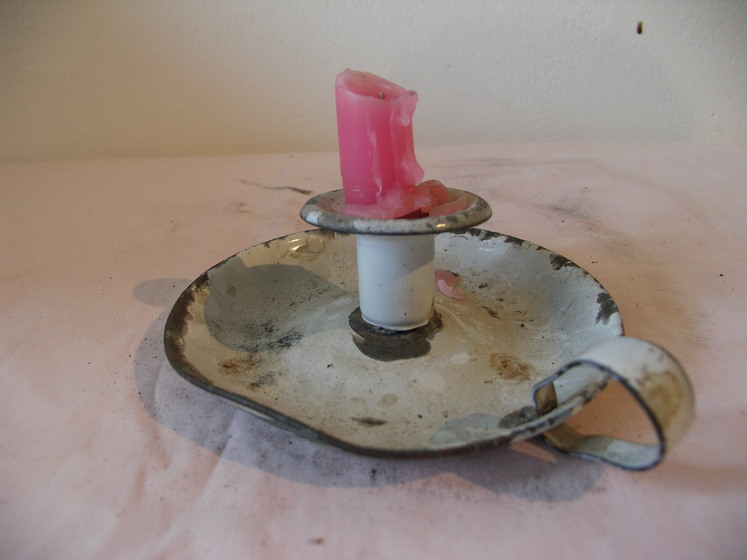candle holder with wax bowl and pink candle