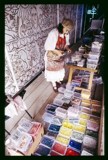 Mirka cuts tiles for her mosaic 