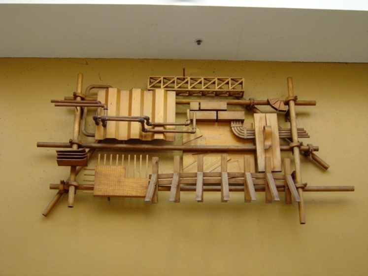 wooden sculpture attached to wall