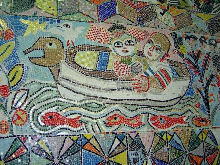 lovers sail down the river (detail) in a boat, with fish underneath and a bird on the bow