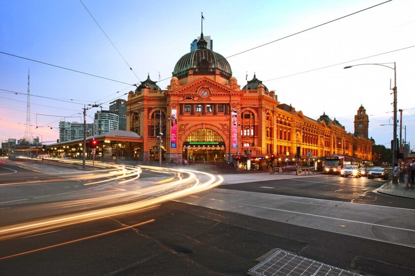 Flinders Station glows molten gold, as cars turn onto Swanston Street in this long exposure image from Major Projects Victoria. 