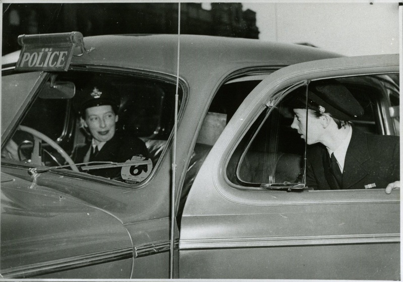 two police women in police car