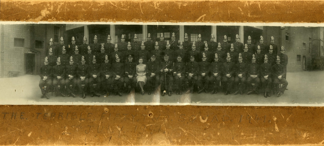 large group of policewomen on brown card