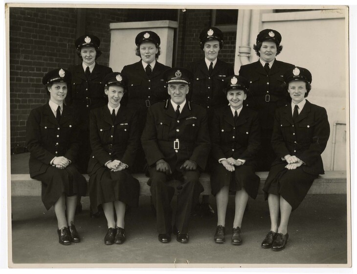 group of eight police women one man in uniform