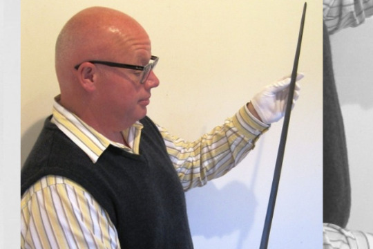 man holding sword