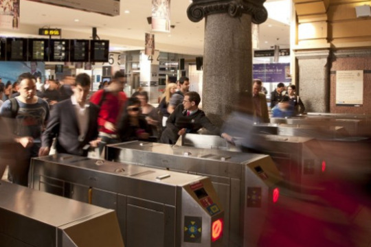 many commuters flow through the barriers