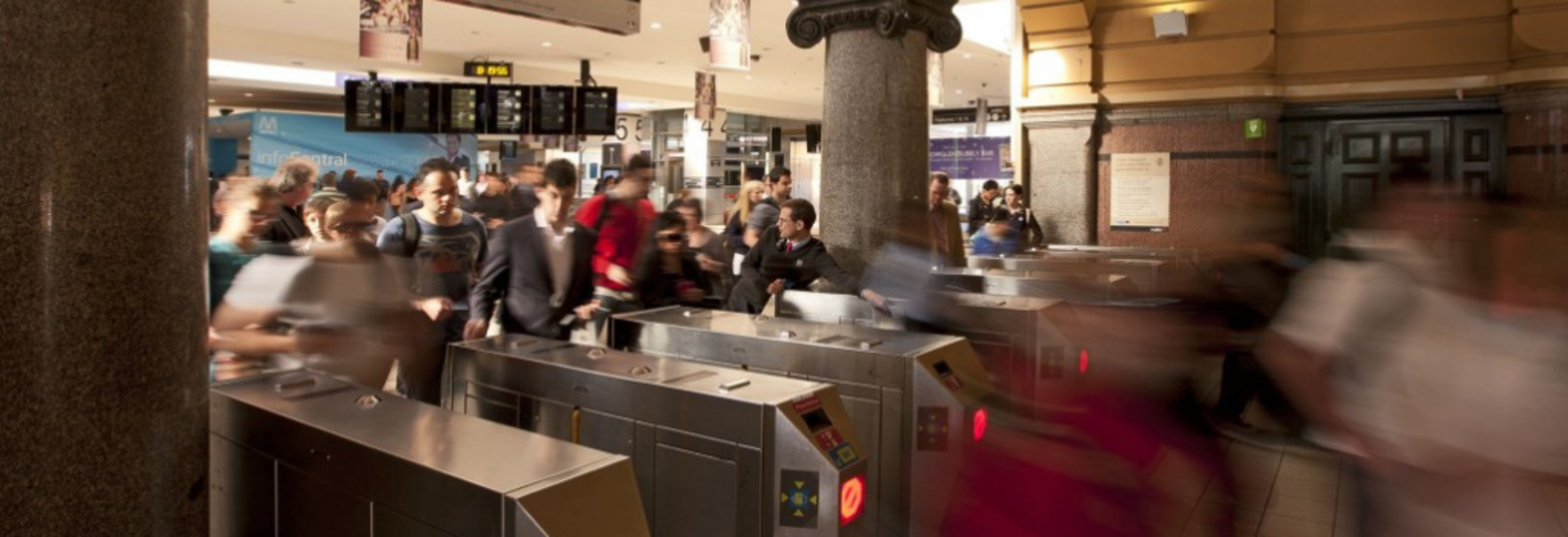 many commuters flow through the barriers